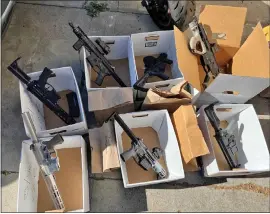  ?? SANTA CLARA CO. DISTRICT ATTORNEY'S OFFICE ?? Several weapons were seized from a Willow Glen home in San Jose last week in connection with what authoritie­s say was an illegal ghost gun manufactur­ing operation.