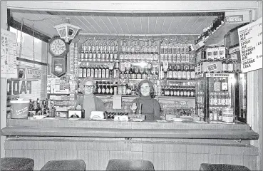  ?? ?? Nuala Fitzgibbon and her mother Chris behind the bar on MacCurtain Street, Fermoy in February 1981.