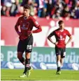  ?? Foto: dpa ?? Hängende Köpfe beim 1. FC Nürnberg nach dem 0:1 gegen Bochum.