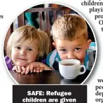  ?? ?? SAFE: Refugee children are given
shelter in Nadyby