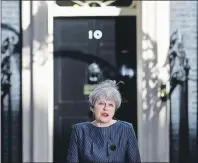  ?? AP PHOTO ?? Britain’s Prime Minister Theresa May speaks to the media outside her official residence of 10 Downing Street in London Tuesday. May announced she will seek early election on June 8.