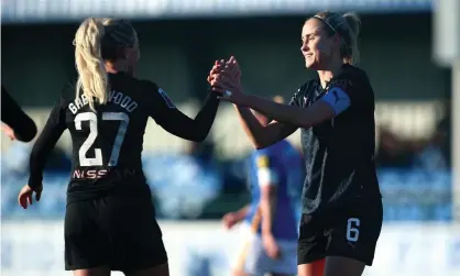  ??  ?? Steph Houghton (right) is congratula­ted by Alex Greenwood after scoring City’s third. Photograph: Manchester City FC/Getty Images