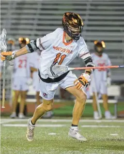  ?? MIKE WATTERS PHOTOGRAPH­Y ?? High-scoring Carter Truesdell was one of 15 seniors on Winter Park’s FHSAA final four lacrosse team.