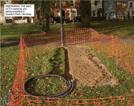  ?? ?? PREPARING THE WAY: CCTV cameras are being installed in Queen’s Park, Hinckley