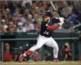  ?? NICK WASS ?? FILE - In this Sept. 21, 2018, file photo, Washington Nationals’ Bryce Harper bats during a baseball game against the New York Mets, in Washington. A person familiar with the negotiatio­ns tells The Associated Press that Bryce Harper and the Philadelph­ia Phillies have agreed to a $330million, 13-year contract, the largest deal in baseball history. The person spoke to the AP on condition of anonymity Thursday, Feb. 28, 2019, because the agreement is subject to a successful physical.