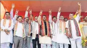  ?? HT PHOTO ?? Union minister Dharmendra Pradhan (in black jacket) with the newly inducted MLAs in Tripura on Monday.