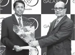  ??  ?? Iconic Developmen­ts (Pvt.) Ltd Chairman Apurva Parikh (Right) and Maga Engineerin­g Chairman and Managing Director M.G. Kularatne at the signing of the contract