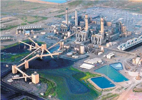  ?? RICHARD PIPES/JOURNAL ?? The coal-fired San Juan Generating Station in northwest New Mexico plans to be out of the coal business altogether by 2031.