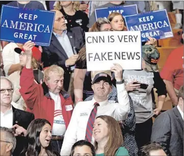  ?? Saul Loeb AFP/Getty Images ?? SUPPORTERS rally during an appearance by President Trump in May 2018 in Elkhart, Ind.