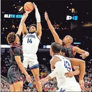  ?? USA Today Sports - Scott Wachter ?? With Justin Moore having suffered a season-ending Achilles injury, Caleb Daniels (14) will be counted on to help pick up the slack as Villanova faces Kansas in the Final Four.