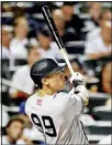  ??  ?? New York Yankees’ Aaron Judge hits a home run against the New York Mets during the second inning of a baseball game on Sept. 11, in New York. (AP)