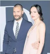  ??  ?? LEFT Jamie Dornan and Dakota Johnson at the premiere of Fifty Shades Darker.