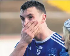  ??  ?? Painful day: A dejected Leo McLoone of Naomh Conaill