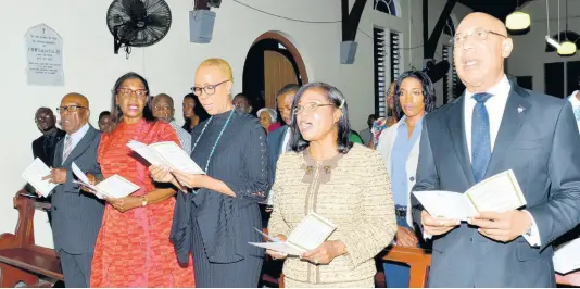  ?? CONTRIBUTE­D ?? Governor General Sir Patrick Allen (right) and Lady Allen (second right) are joined by (from left) chairman, National Prayer Vigil Committee, Rev Dr Roy Henry; Custos Rotulorum of St Thomas Marcia Bennett; and Minister of Science, Energy and Technology Fayval Williams, in worship at the 27th annual national prayer vigil, held on December 8 at the Coke Methodist Church, Morant Bay, St Thomas.