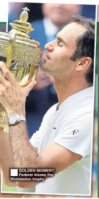  ??  ?? GOLDEN MOMENT: Federer kisses the Wimbledon trophy