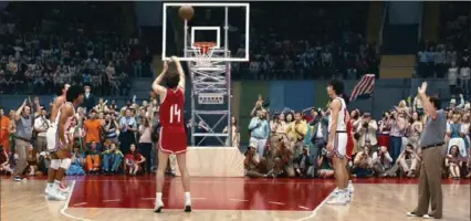  ?? THE ASSOCIATED PRESS ?? Russian actor Ivan Kolesnikov plays Alexander Belov, a player on the 1972 USSR national basketball team, during a scene in the movie “Going Vertical.”