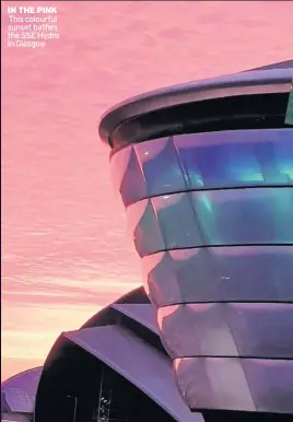  ??  ?? IN THE PINK This colourful sunset bathes the SSE Hydro in Glasgow