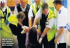  ??  ?? HELD Police with woman who attacked NHS worker