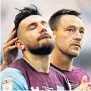  ??  ?? DEJECTED: John Terry consoles Robert Snodgrass