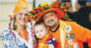  ?? ?? Netherland­s fans celebrate after the match against the US.