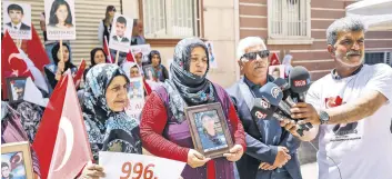  ?? ?? Another family joins the Diyarbakır protests in the southeaste­rn province, Turkey, May 25, 2022.