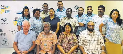  ?? Picture: SUPPLIED ?? Tour Managers Fiji managing director Damend Gounder, (sitting - 2nd from left) with his management team at the announceme­nt of the company’s multimilli­on-dollar investment roll-out plans in Nadi this week.