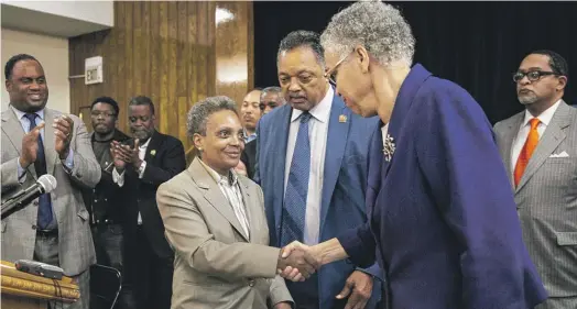  ?? ASHLEE REZIN GARCIA/SUN-TIMES FILE ?? Mayor Lori Lightfoot and her former mayoral opponent, Cook County Board President Toni Preckwinkl­e, had a public display of unity after Lightfoot’s election in 2019, but the two have sometimes been at odds since then.
