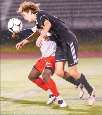  ?? Photo by Chuck Nadeau ?? The Tolman boys soccer team is headed back to the state final after the No. 5 Tigers downed No. 1 North Kingstown, 2-1, in the state semifinals Thursday night at East Greenwich High. The Tigers will face No. 3 La Salle for the title Sunday at Cranston Stadium.