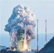  ?? YONHAP VIA AP ?? The Nuri rocket thunders toward orbit Thursday from the Naro Space Center in South Korea. Nuri is the country’s first rocket built entirely with domestic technology.