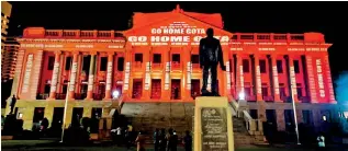  ?? ?? SUNDAY NITE LIGHT SHOW: Old Parliament all lit up for the night with protesters ‘signature cry’