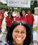  ?? COURTESY ?? Chandra Haslem tours the Grove Park neighborho­od with the Bank of America 2021 student leaders (left to right) Divine Madubike, Oumy Gueye, Minji Kang, Esther Ceballo and Jamal Sayid.