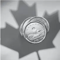  ?? MARK BLINCH/REUTERS ?? A Canadian dollar coin, commonly known as the “Loonie”, is pictured in this illustrati­on picture taken in Toronto in 2015.