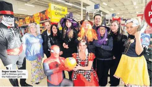  ??  ?? Super team Tesco staff in Wishaw got into the Halloween spirit