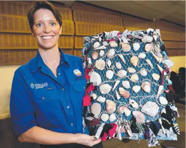  ?? Picture: STEWART McLEAN ?? PROJECT: Weipa-based occupation­al therapist Dr Alice Cairns with a sensory board for dementia patients. Her grant will be used for community rehabilita­tion and lifestyle in Cape York.