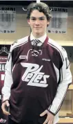  ?? SUPPLIED PHOTO ?? Peterborou­gh goalie Blake Curran dons a Peterborou­gh Petes jersey after he was drafted Wednesday night in the inaugural OHL Under-18 Priority Selection.