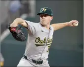  ?? MICHAEL AINSWORTH — THE ASSOCIATED PRESS ?? Oakland Athletics pitcher J.P. Sears throws during the second inning against the Texas Rangers on Thursday in Arlington, Texas.