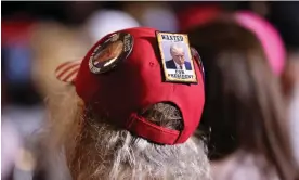  ?? Photograph: Scott Morgan/Reuters ?? A supporter listens as former president Donald Trump speaks during a 2024 presidenti­al campaign rally in Dubuque, Iowa, on Wednesday.