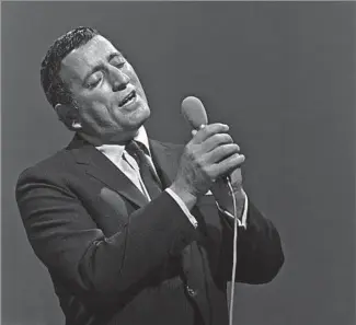  ?? NBCUnivers­al via Getty Images ?? A UNIQUE TALENT
Tony Bennett, shown at the 1966 Grammy Awards, wowed his contempora­ries with his abilities. “He excites me when I watch him — he moves me,” Frank Sinatra once said.