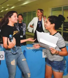  ?? Atiq ur Rehman/Gulf News ?? Sama Nabulsi and Vanya Srivastava celebratin­g after got the result at Gems Wellington Internatio­nal School, Dubai.