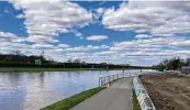  ?? JANA COLLIER / CONTRIBUTE­D ?? Riverfront Park will officially open with an event May 10. The 7-acre park hugs the Great Miami River through downtown Miamisburg.