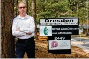  ?? STEVE SCHAEFER FOR THE AJC ?? City Councilman Brian Mock, who worked on the new map’s borders, notes that Dresden Elementary School, where more than 95% of students are Hispanic, would be included in District 4.