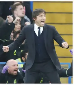  ??  ?? Chelsea's manager Antonio Conte celebrates after Chelsea's Diego Costa scores a goal during the English Premier League soccer match between Chelsea and Middlesbro­ugh at Stamford Bridge stadium in London Monday. (AP)