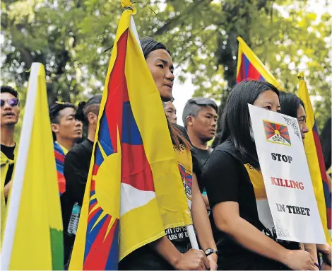  ?? Picture: SAJJAD HUSSAIN / AFP ?? LONG EXILE: Exiled Tibetan activists take part in a protest marking the 60th anniversar­y of the 1959 Tibetan uprising against Chinese rule in the Indian capital New Delhi on Sunday