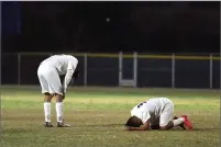  ?? RECORDER PHOTO BY CHIEKO HARA ?? Strathmore High School's Enrique Gomez, left, and Luis Lopez react after losing to Orange Cove High School on Friday in the CIF Central Section Division VI final at Spartan Stadium in Strathmore.