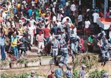  ?? AFP ?? Security forces intervene on Meskel Square in Addis Ababa on Saturday, after the explosion.