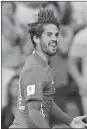  ?? Paul White / AP ?? Spain’s Isco celebrates after scoring his side’s second goal during the World Cup Group G qualifying soccer match between Spain and Italy in Madrid.