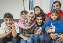  ??  ?? From the left, Hussein, 12, Mariam, 6, mom Nadiah, Mahmoud, 9, top, Khaled, 13, bottom, Saleh, 4, dad Abdullah relax at their home in Surrey.