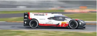  ??  ?? Brendon Hartley, Earl Bamber and Timo Bernhard tested the Porsche 919 Hybrid at Monza.