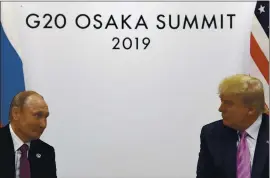  ?? SUSAN WALSH — THE ASSOCIATED PRESS ?? Russian President Vladimir Putin, left, and President Donald Trump meet in June 28, 2019, during a bilateral meeting on the sidelines of the G-20 summit in Osaka, Japan. It’s possible the New SALT agreement will expire on Feb. 5, 2021.
