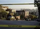  ?? Photograph: Eric Risberg/AP ?? Police tape blocks a street outside the home of Nancy and Paul Pelosi in San Francisco.